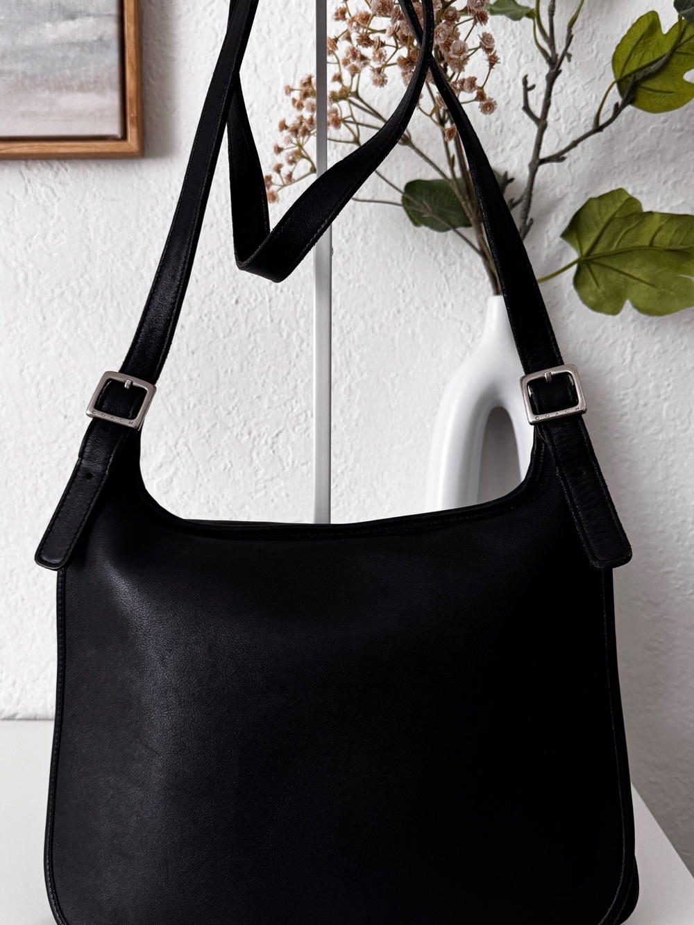 Coach Hippie Flap in Classic Black Smooth Leather.